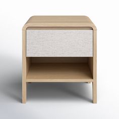 the side table is made out of wood and has two drawers on each side, one with