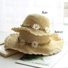 Stay stylish and protected with our matching family straw hats. Made from lightweight, breathable natural straw, these hats feature a wide, scalloped brim for excellent sun protection and are adorned with charming artificial daisies. Available in both kid and adult sizes, they are perfect for creating adorable matching outfits for beach outings, garden parties, and picnics. Enjoy comfort and whimsy with these durable, fashionable hats. Material: 100% strawSize:Adult Size: Head size 54-58cmKid Si Bohemian Adjustable Sun Hat For Spring, Summer Sun Straw Hat In Paper, Spring Beach Hat With Uv Protection, Lightweight Bohemian Straw Hat For Spring, Bohemian Paper Straw Hat For Spring, Spring Beach Straw Hat With Uv Protection, Wide Brim Paper Straw Hat For Summer, Bohemian Straw Bucket Hat For Spring, Bohemian Paper Straw Sun Hat For Spring