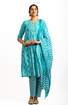 This cotton Anarkali suit has 3/4th sleeves and a combination of prints. It comes with a printed Dupatta and straight-printed pants. Offered in four different sizes from M to XL About Pironah Discover Pironah, your go-to for Indo-Ethnic and Fusion Wear on Etsy! 🌟 From Silk Suits to Anarkalis, trendy Co-ord Sets, and many more, our curated collection blends tradition and contemporary style. Shop exclusively at https://www.pironah.com for FREE 30-day exchanges and easy returns. Elevate your wardr Cotton Palazzo Set With Printed Border For Festivals, Printed Cotton Traditional Wear For Diwali, Cotton Anarkali Set For Eid With Printed Details, Eid Cotton Anarkali Set With Printed Details, Traditional Cotton Pant Set With Printed Motifs, Printed Cotton Sets For Navratri, Printed Cotton Anarkali Dupatta, Diwali Printed Cotton Anarkali Set, Diwali Cotton Anarkali Set With Print