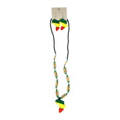 This Rasta/Africa Beaded Necklace Set showcases African pride in classic African colors. This necklace is perfect for any lover of all things Africa! The necklace has a green, yellow, and red Africa pendant, each colored section conjoined with small rings. The necklace chain has colorful small beads interspersed between larger beads. The earrings have the same pendants hanging from silver hooks. This jewelry set will show your love of Africa while looking stylish at the same time. Made in Philip Africa Pendant, Fulani Earrings, Afrocentric Jewelry, African Symbols, African Colors, Cowrie Shell Necklace, Twisted Bracelet, Bone Necklace, Bone Pendant