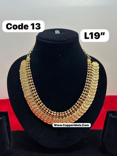 sizes in terms of height and weight are mentioned in grams and inches in the photo Gold Dual-tone Jewelry For Puja, Traditional Heavy Gold Necklaces, Heavy Gold Bollywood Necklaces, Heavy Gold Bollywood Necklace, Heavy Traditional Gold Necklace, Gold Heavy Bollywood Necklace, Traditional Heavy Gold Necklace, Gold Dual-tone Temple Necklace For Puja, Heavy Gold Necklaces For Puja