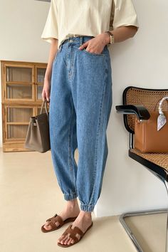 These "Denim Jogger Pants" blend casual comfort with street style effortlessly. They showcase a relaxed fit with a tapered, elasticized hem that adds a playful jogger silhouette, ideal for laid-back days or trendy outings. Pair with a simple tee and slides for an off-duty look that's both chic and cozy. Color : Denim Size : Small / Medium / Large Small - Waist : 25~26" / Inseam : 26" Medium - Waist : 27~28" / Inseam : 26" Large - Waist : 29~30" / Inseam : 26" Model : 5’4″ (164cm) wearing small size Content: 100% Cotton Care Instructions : Gentle Cycle Machine Wash Cold With Like Colors *** Please note this item ships out in approx. 5~10 days after order placement *** Denim Jogger Pants, Denim Joggers, Back Day, Simple Tees, Denim Pant, Small Waist, Off Duty, Jogger Pants, Set Dress