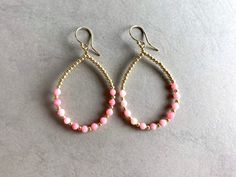 HOOP EARRINGS PINK; IN GOLD; ROSEGOLD OR SILVER Summer Hoops, Boho Style with pink colored Mother of pearl beads. If you are interested in these earrings with other stones, you are welcome to contact me. I have a lot more Colors and stones that I can make them with. I package my jewelry in a pretty cotton pouch for sending. MATERIAL Gold filled, Rose Gold filled or Silver  Mother of pearls, dyed Dainty Pink Jewelry For Mother's Day, Handmade Pink Jewelry For Mother's Day, Pink Gold Small Hoop Jewelry As Gift, Handmade Pink Jewelry With Round Beads, Round Pink Earrings For Jewelry Making, Pink Adjustable Jewelry, Pink Gold Small Hoop Jewelry For Gift, Handmade Pink Jewelry For Gifts, Small Pink Hoop Earrings Nickel Free