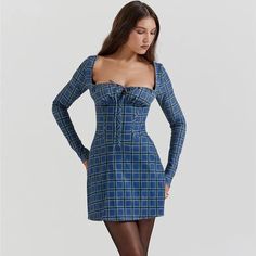 Discover Timeless Elegance Step into the new season with style in our Chic Tartan Backless Mini Dress, a perfect blend of classic charm and contemporary flair. Tailored for the modern woman, this dress is designed to make a statement at any spring or summer occasion. Whether you're attending a casual get-together or a sophisticated soiree, this dress promises to keep you at the forefront of fashion. Exquisite Features Our dress boasts a captivating square collar that elegantly frames the necklin Square Neck Fitted Corset Dress For Night Out, Fitted Square Neck Corset Dress For Night Out, Fitted Long Sleeve Corset Dress For Date Night, Fitted A-line Mini Dress For Date Night, Chic Long Sleeve Corset Dress For Spring, Chic Bodycon Mini Corset Dress, Long Sleeve Corset Dress For Night Out, Fitted Mini Dress With Square Neck For Dress Down, Fitted Square Neck Mini Dress For Dress Down Events