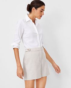 Elevate your summer wardrobe with the Ann Taylor Button Tab Short in Linen Blend, a perfect blend of elegance and comfort. These shorts are designed to flatter with a high-rise waist that sits just below the natural waistline and a polished button tab that adds a sophisticated touch. 

- Size: 12
- Color: Pearl Shadow
- Material: 54% Linen, 29% Polyester, 15% Viscose, 2% Spandex
- Gender: Female
- Fit: Relaxed and easy
- Length: Short length with a 5" inseam and 27" leg opening
- Features: Front Shadow Color, Ann Taylor Petite, Style Steal, Petite Shorts, Blazer And Skirt, Casual Design, Sleepwear & Loungewear, Petite Fashion, White Summer