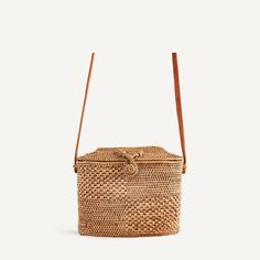 From the cobble-stoned streets of Lisbon to sun-soaked Amalfi, this is a staple vacation accessory. A classic basket bag with a crisscross clasp and angular top roof, it’s sturdy enough to hold your vintage camera. Slip it on with a pair of sandals and your best denim to whisk yourself into summer. Handwoven rattan Lea Rose Bag, Vacation Accessories, Black Houndstooth, Basket Bag, Vintage Camera, Small Accessories, Medium Bags, Amalfi, Lisbon