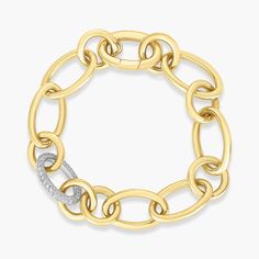 Indulge in luxury with this extravagant piece by Roberto Coin. The Diamond Alternating Link Chain Bracelet in 18K Yellow Gold exudes an aura of opulence. It is crafted with linking chains of yellow gold and a single white gold link that is embellished with diamonds. It is impossible to go unnoticed when you wear this bracelet to any event. Luxury Yellow Gold Diamond Bracelet With Cable Chain, Diamond Cable Chain Bracelet In Yellow Gold, Luxury White Gold Cable Chain Bracelet, Yellow Gold Bracelets With Cable Chain, Formal Gold Bracelet With Chunky Chain, White Gold Oval Link Chain Diamond Bracelet, Yellow Gold Bracelet With Chunky Oval Link Chain, Elegant Gold-tone Cable Chain Bracelet, Gold Chain Diamond Bracelets