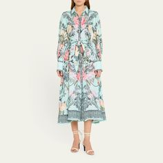 Camilla shirtdress is decorated in an illustrative floral print with crystal accents Point collar; full button placket Long blouson sleeves with button cuffs Shirred elastic back panel Versatile waist ties Midi length A-line silhouette Linen Imported Promise Land, Flowy Design, Shirtdress, Button Placket, Waist Tie, Midi Length, Design Details, The Dress, Tops Designs