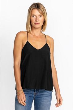 A statement in simplicity, the Etta Cami Top is the perfect addition to any wardrobe. Its luxurious silk blend allows this top to function as a stunning stand-alone piece or as a layering staple. Pair with a maxi skirt and espadrille sandals or layer with a denim jacket and palazzo pants for an easy casual vibe. Johnny Was Women's Etta Cami Top in Black, Size XS, Silk/Denim Sleek Cami Tops For Spring, Sleek Spring Camisole Top, Sleek Viscose Top For Night Out, Sleek V-neck Top For Summer, Black Silk Top For Spring, Black Silk Tops For Spring, Sleek Summer Cami Top, Casual Black Silk Top, Sleek Viscose Summer Tops