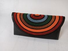 African purses, bags,African print bag, women purses ,gift for her,beaded purse, valentine gift for her 100% handmade using soft leather and fine beads Very beautiful and unique Very stylish Perfect for weddings, parties and African themed events We ship via DHL express For wholesale please contact us Beaded Clutch Shoulder Bag For Gifts, Beaded Clutch Shoulder Bag As Gift, Beaded Pouch Shoulder Bag For Gift, Beaded Pouch Shoulder Bag As Gift, Multicolor Clutch Bag For Gift, Beaded Pouch Evening Bag As Gift, Beaded Pouch Evening Bag For Gift, Multicolor Clutch Shoulder Bag Gift, Beaded Rectangular Clutch For Gift