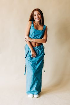 Our Hit Me Baby Parachute Set comes with a fab parachute fabric crop top, cargo skirt, and it's all in a dreamy dusty blue. Jump on in! 🤗 Top Celeste, Cargo Skirt, Dusty Blue, Jumpsuit Dress, Crop Top, Crop Tops, Let It Be, Skirt, Fabric