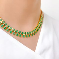 Unleash your inner diva with this 18k Yellow Gold Emerald and Diamond Necklace Set, weighing 41.8g. Encrusted with 2.95 ct diamonds of F-G color and VS quality, this set radiates luxury. With an adjustable link, matching earrings, and a screw-back post, it's perfect for any occasion. The hook lock adds to its elegance. This high fashion set is a must-have in your collection. PRODUCT DETAILS Gold Purity(karat): 18k Item Weight(grams): 41.8 Item Finish: Yellow Gold Stone: Diamond Diamond Weight(ca Green Diamond Necklace For Formal Occasions, Formal Green Hallmarked Diamond Necklace, Exquisite Green Diamond Necklace For Formal Occasions, Elegant Hand-set Emerald Necklace In Yellow Gold, Green Hallmarked Diamond Necklace Fine Jewelry, Elegant Yellow Gold Hand Set Emerald Necklace, Green Hallmarked Diamond Necklace, Elegant Yellow Gold Emerald Necklace With Diamond Accents, Exquisite Gold Hand Set Emerald Necklace