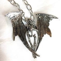 Mythical Winged Skeleton Creature Necklace Nwot Perfect Accent For Your Halloween Or Cosplay Party Costume Lightweight Silver Metal 21" Chain Creature - 3" X 3" 7 Punk Metal Necklaces For Cosplay, Punk Metal Necklace For Cosplay, Punk Style Metal Necklace For Cosplay, Silver Punk Costume Jewelry, Silver Punk Jewelry For Costume, Halloween Cosplay Jewelry In Metal, Punk Style Silver Jewelry For Costumes, Halloween Cosplay Metal Jewelry, Edgy Metal Necklace For Halloween