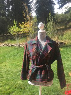 Cool colorful plaid 90's flannel coat from Rampage. Has tie at waist, which is not removable. Super warm, large collar. Cropped fit. Lined. Size small. Casual Plaid Winter Blazer, Casual Plaid Blazer For Fall, Plaid Wool Outerwear For Spring, Spring Plaid Wool Outerwear, Fitted Plaid Outerwear For Fall, Vintage Plaid Long Sleeve Outerwear, Vintage Plaid Long-sleeve Outerwear, Vintage Long Sleeve Plaid Outerwear, Retro Plaid Collared Outerwear