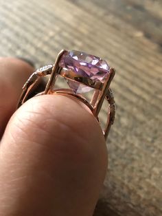 A gorgeous vintage style rose gold 10CT oval cut Rose de France Amethyst. Natural Rose de France Amethyst - 10CT Oval 18K Rose Gold/ 925 sterling Side stones white topaz gift box Luxury Rose Gold Amethyst Ring With Prong Setting, Oval Rose Gold Jewelry With Vs Clarity, Luxury Rose Gold Amethyst Ring With Center Stone, Formal Rose Gold Amethyst Ring With Gemstone Accents, Classic Rose Gold Amethyst Jewelry, Rose Gold Amethyst Ring With Gemstone Accents, Formal Rose Gold Amethyst Ring With Center Stone, Luxury Rose Gold Amethyst Ring As Gift, Classic Amethyst Rose Gold Jewelry