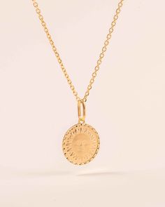 Add a touch of vintage vibe to your jewelry collection with our Brushed Gold Radiant Sun Necklace Charm. This classic sun charm exudes playful vibes and is perfect for stacking with your favorite pieces. Upgrade your style with this classic and fun addition! Details:14k solid goldOval bail height: 8mm Charm diameter: 15mmCHARM ONLY Shipping & Returns:Orders can be cancelled only within the first 24 hours.Most of our pieces are made to order, please allow 4-7 weeks for production.Free exchanges o Sun Charm, Sun Necklace, Necklace Charm, Vintage Vibe, Vintage Vibes, Charm Necklace, Jewelry Collection, Yellow Gold, Sun