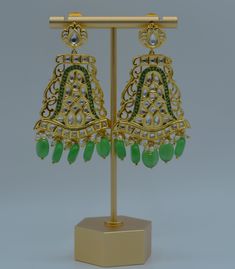 Premium quality Nawabi uncut Kundan Meenakari Statement Earrings with Monalisa tassels. Earrings length: Approx. 3” Light weight Push-Back closure Micro Gold plated on high-quality brass as base metal Availability: In-Stock *Color may vary slightly due to light condition & photography. Jewelry Care: Keep away from moisture. Allow perfumes and lotion to dry before wearing. Store in jewelry pouch. Clean only with soft lint free cloth. Sabyasachi Earrings, Earrings Kundan, Tassels Earrings, Photography Jewelry, Earrings Indian, Kundan Earrings, Indian Earrings, German Silver, Enamel Earrings