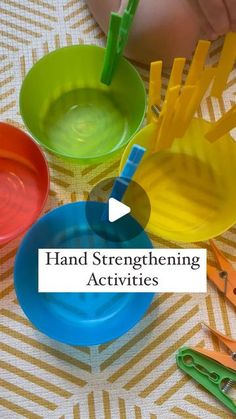 the child is playing with colorful plastic bowls and scissors on the tablecloth that has text overlay reading hand stretching activities