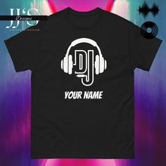 PERSONALIZED DJ T-shirt for men! Add your custom text, name or logo to this design! Perfect gift for DJ's! High quality custom T-shirt!  * 100% cotton  * Sport Grey is 90% cotton, 10% polyester  * Ash Grey is 99% cotton, 1% polyester  * Heather colors are 50% cotton, 50% polyester  * Fabric weight: 5.0-5.3 oz/yd² (170-180 g/m²)   * Open-end yarn  * Tubular fabric  * Taped neck and shoulders  * Double seam at sleeves and bottom hem  * Blank product sourced from Honduras, Nicaragua, Haiti, Dominican Republic, Bangladesh, Mexico This product is made especially for you as soon as you place an order, which is why it takes us a bit longer to deliver it to you. Making products on demand instead of in bulk helps reduce overproduction, so thank you for making thoughtful purchasing decisions! Black Band Merch T-shirt With Name Print, Customizable Black T-shirt With Name Print, Custom Logo Black T-shirt, Black T-shirt With Custom Logo, Fitted Music-themed T-shirt For Streetwear, Fitted Music-themed Streetwear T-shirt, Band Merch T-shirt With Name Print, Fitted Black Music-themed T-shirt, Black Fitted Music-themed T-shirt