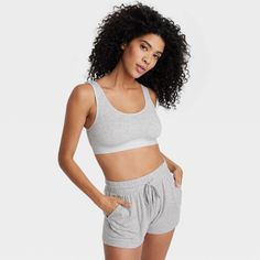 Stay comfortable and stylish at home or when running errands in this Cotton Stretch Unlined Scoop Bralette from Auden™. The jersey pullover bralette is made of a cotton-blend fabric with added spandex for a flexible fit that moves with you, while the full lining provides extra coverage. The fashionably simple bralette features wireless unlined cups for added comfort and a sleek, smooth look. Auden™: Fit for you in every way. Casual Activewear With Built-in Bra For Loungewear, Seamless Cropped Sports Bra For Loungewear, Cropped Sports Bra For Spring, Everyday Cotton Bra, Cropped Bra With Built-in Bra For Loungewear, Basic Cotton Crop Top, Bra Friendly, Cropped Sports Bra With Built-in Bra For Loungewear, Seamless Cotton Tops For Lounging, Cropped Sports Bra With Built-in Support For Loungewear