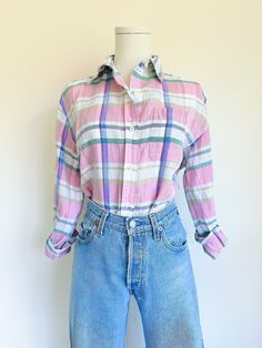 Perfect 90's pastel linen moment. Button down, windowpane plaid, single breast pocket. 🍬 Amazing vintage condition, no flaws to note.  Measurements: Pit to pit: 21" Shoulder to shoulder: 17" Sleeves: 21" Length: 22-28" Tag size small. 100% linen. Modeled on size small dress form. Best fits a modern small. Spring Plaid Flannel Shirt With Buttons, Vintage Button-up Flannel Shirt For Spring, Plaid Flannel Shirt For Everyday Spring Wear, Spring Everyday Plaid Shirt, Vintage Shirt For Everyday Spring Wear, Vintage Plaid Flannel Shirt For Spring, Everyday Long Sleeve Flannel Shirt For Summer, Pastel Top, Windowpane Plaid