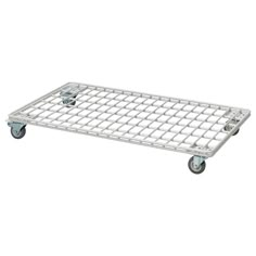 a white metal shelf with wheels on it