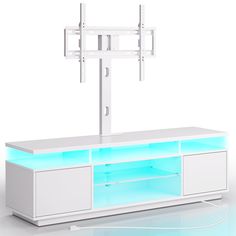 a white entertainment center with blue lights on it