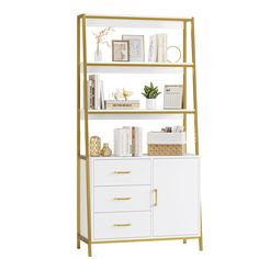 a white and gold bookcase with drawers