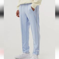 Nwt Men's Nike Jogger Pants. It Has Drawstring Waist, 2 Front Pockets, 1 Back Snap Pocket And Zippers On Sides To Make Legs Wider. Style Is Standard Fit With Tapered Legs. Material Has Almosy A Scuba Like Material Feel And Has Some Stretchy To It. Rare!!! Casual Blue Pants With Straight Hem, Nike Fitted Sweatpants With Pockets, Nike Relaxed Fit Tapered Leg Pants, Nike Relaxed Fit Trousers, Fitted Nike Bottoms With Pockets, Blue Straight Hem Bottoms For Streetwear, Nike Casual Pants For Spring, Spring Nike Trousers, Nike Relaxed Fit Pants With Straight Hem