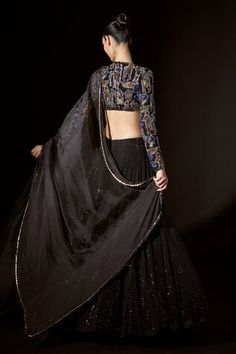 Black net lehenga with an attached cancan and crystal embellishments. Comes with a blouse and a dupatta with big stone work. - Aza Fashions Black Hand Embellished Lehenga For Festive Occasions, Evening Lehenga With Mirror Work In Organza, Hand Embellished Evening Lehenga For Diwali, Hand Embellished Lehenga For Diwali Evening, Hand Embellished Lehenga For Evening Diwali Festivities, Hand Embellished Lehenga For Evening Diwali Celebration, Evening Hand Embellished Lehenga For Diwali, Festive Black Hand Embellished Choli, Luxury Black Hand Embellished Lehenga