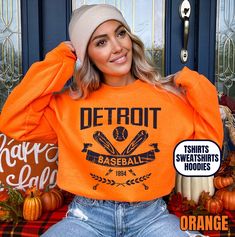 Please read the description completely and review all photos before ordering. Our Detroit Baseball Apparel is the perfect way to cheer on the home team this season. Ideal for game day, tailgates or everyday wear. Makes a great gift for any fan. This listing is for the distressed design. Click the link below for the non-distressed version: https://tandtapparel21.etsy.com/listing/1672213846/vintage-style-detroit-baseball-t-shirt SHIRT DETAILS Bella Canvas Unisex - Solid colors: 100% Cotton. - Heather colors: 52% Cotton + 48% Polyester - Runs true to size. (For looser or oversized fit consider going up a size or 2. See photos for size chart.) SWEATSHIRT & HOODIE DETAILS Gildan Heavy Blend Unisex - 50% Cotton + 50 Polyester - Runs true to size. (For looser or oversized fit consider going up a Pre-shrunk School Spirit Hoodie For Sports Season, Varsity Crew Neck Hoodie For Game Day, Crew Neck T-shirt For Game Day In Fall, Collegiate Winter T-shirt For Streetwear, Moisture-wicking Fan Apparel Sweatshirt For Streetwear, Team Spirit Hoodie With Crew Neck For Game Day, Fall Team Spirit T-shirt For Streetwear, Game Day Fan Apparel Hoodie, College Fan Apparel Crew Hoodie