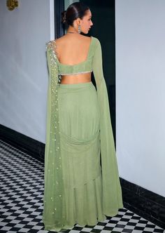 Sage Green Pre-Draped Sari Green Georgette Draped Saree, Evening Green Blouse Piece With Sheer Dupatta, Green Pre-draped Saree With Sheer Dupatta For Evening, Festive Georgette Dupatta With Draped Sleeves, Green Blouse Piece For Evening With Traditional Drape, Green Draped Lehenga With Cutdana, Designer Georgette Dupatta With Draped Sleeves, Festive Dupatta With Draped Sleeves In Georgette, Green Draped Dupatta For Wedding