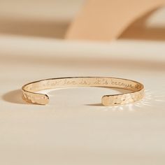 Let the bracelet do with talking with our Hammered Open Bangle. A beautiful hammered texture reveals your personalized message on the inside, wear alone or stack together with other personalized engraved bracelets to tell a special story.18K Champagne Gold Plated, 925 Sterling Silver or 18K Rose Gold PlatedSize: Approx. 2.4 x 2Width of bangle: 0.2The opening of the bangle is 1. The metal has slight flexibility, allowing the wearer to put the bangle on, wear it securely and take it off easilyHand Luxury Minimalist Engraved Bracelets, Luxury Minimalist Engraved Jewelry, Affordable Engraved Wedding Bracelets, Luxury Hammered Gold Bracelet As Gift, Luxury Etched Gold Bracelet Gift, Jewellery Photo, Glow Jewelry, Engraved Bangle, Cursive Script