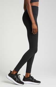 The moisture-wicking tech of stretchy, brushed Zeltek fabric keeps you cool as your workout warms up in these leggings topped with a high, slip-free waistband. 29" inseam; 8 1/2" leg opening;  (size Medium) Elastic waistband with hidden pocket Brushed, moisture-wicking fabric dries quickly to keep you cool and comfortable Smooth flatlock seaming designed to eliminate rubbing and irritation 88% polyester, 12% spandex Machine wash, tumble dry Imported High Stretch Elastane Tights For Sports, Stretch Functional Leggings For Training, Functional Stretch Leggings For Training, Breathable Elastane Leggings For Pilates, Functional Tight Leggings With Contoured Waistband, Workout Full-length Tights With Contoured Waistband, Sporty Compressive Leggings For Training, Sporty Compressive Training Leggings, Breathable Functional Leggings For Running