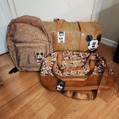 Bioworld Mickey Mouse 20" Duffel Weekender Bag Bioworld Mickey Mouse Duffel Travel Bag Bioworld Mickey Mouse Backpack Brand New With Tags Willing To Sell Individually Designer Brown Luggage For Daily Use, Brown Duffle Bag With Removable Pouch For On-the-go, Rectangular Brown Luggage For Shopping, Brown Coated Canvas Satchel With Luggage Sleeve, Designer Brown Shoulder Bag For Travel, Brown Coated Canvas Shoulder Bag With Luggage Sleeve, Designer Brown Luggage, Luxury Brown Coated Canvas Luggage, Designer Brown Travel Bag With Leather Handles