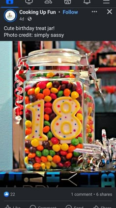 a glass jar filled with lots of candy