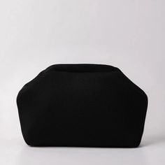 Hey there! Introducing the chic and timeless Black Clutch Handbag from Lunarity Garage! This stylish clutch is the perfect addition to your accessory collection, offering both elegance and practicality. Crafted with meticulous attention to detail, the Black Clutch Handbag features a classic black color that exudes sophistication and versatility. Whether you're attending a formal event or going out for a night on the town, this clutch effortlessly complements any outfit. Its sleek and compact des Versatile Black Evening Bag For Formal Occasions, Versatile Black Evening Bag For Formal Events, Versatile Black Formal Evening Bag, Versatile Black Box Bag For Evening, Black Handheld Pouch For Formal Occasions, Modern Black Clutch Bag, Chic Evening Pouch With Top Handle, Trendy Black Clutch Evening Bag, Versatile Black Evening Bag For Daily Use