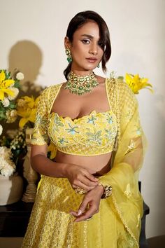 Yellow lehenga featuring floral hand embroidery with beads and sequins. Paired with a padded blouse and a dupatta, both adorned with intricate embroidery details., Fit: Relaxed Reception Sharara With Tilla Details, Navratri Reception Dress With Tilla Detailing, Tilla Dress For Navratri Reception, Diwali Reception Choli With Tilla Details, Eid Reception Tilla Choli, Bollywood Style Tilla Dress For Reception, Festive Dress With Tilla For Reception, Festive Tilla Dress For Reception, Eid Fitted Anarkali Set With Tilla Details