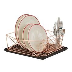 the dish rack has four plates and two silverware in it