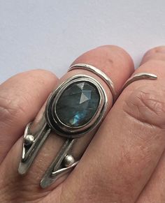 This Labradorite Queen is for the queen!! I adore this ring... finally time to let it go! A stunning rose cut super Blu flash Labradorite stone is held within a simple bezel with rope border. This setting sits atop a chunky band with angular details. Ring band has rope border as well as fine silver ball details at the top.  I have oxidized and polished this beauty up to showcase the gorgeous Labradorite. Handmade from scratch & ready to ship! Xo  *Size 6* *Please feel free to ask me additional q Silver Ring Chunky, Silver Smithing Jewelry, Silversmith Rings, Jewelry Closet, Rope Border, Armor Ring, Silversmith Jewellery, Funky Jewelry, Spinner Ring