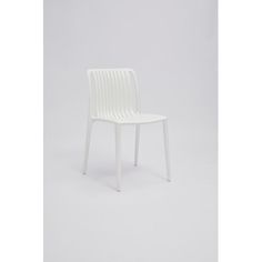 a white plastic chair against a white background