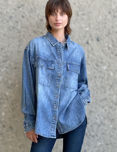 We set out to design a denim shirt that was adorable/comfy-beyond-words/every-day versatile. We didn't know it would become one of our all-time faves. Introducing the Oversized Denim Shirt from Wash Lab, in super-soft premium denim, in a flowy-free oversized cut that just feels...perfect! The model is 5'7" wearing size small Fabric: 100% Cotton Trendy Light Wash Denim Top For Everyday, Oversized Denim Blue Casual Top, Light Wash Casual Denim Top For Everyday, Casual Oversized Denim Blue Top, Oversized Casual Denim Top, Casual Light Wash Denim Top For Everyday, Relaxed Fit Denim Top With Pockets For Everyday, Light Indigo Tops With Pockets For Everyday, Everyday Light Indigo Tops With Pockets