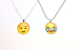 "These super awesome emoji necklaces are perfect for any emoji lover....any kids, teens or college students! Makes the perfect Christmas gift or stocking stuffer- or gift just because! Includes: -Your choice of one emoji face -Comes on your choice of a silver rolo adjustable necklace or 18\" metal ball chain necklace -Comes in a beautiful drawstring pouch Please contact us with any questions. We are here to help! Please visit our shop as we have a large variety of Firefighter, Medical, Science a Adjustable Fun Charm Necklaces For Gifts, Adjustable Fun Charm Necklaces As Gift, Adjustable Fun Style Charm Necklace Gift, Trendy Hypoallergenic Charm Necklaces For Gift, Trendy Hypoallergenic Charm Necklaces As Gifts, Trendy Hypoallergenic Charm Necklace For Gift, Novelty Smiley Face Jewelry For Gifting, Fun Personalized Charm Necklaces For Gifts, Novelty Smiley Face Jewelry For Gifts