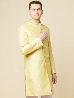 This Lime Yellow Embroidered Sherwani Set will instantly give an elegant look. It features embroidered front buttons fastening, designer cuff buttons and a mandarin collar. The lime yellow sherwani is made of cotton and polyester material with intricate jacquard pattern and premium lining. It is paired with white churidar pants. An ideal outfit for traditional occasions, and special events.

Size Chart For Men





	
	
					Men's Size Chart
		

		
		
						
				Size Chart For Men
				Custom Size Designer Yellow Bandhgala Straight Kurta, Yellow Designer Wear Sherwani Straight Kurta, Designer Yellow Sherwani For Eid, Yellow Sherwani With Dabka Work For Designer Wear, Designer Yellow Sherwani With Dabka Work, Elegant Pista Green Bandhgala For Diwali, Formal Pista Green Sherwani With Chikankari Embroidery, Yellow Sherwani With Traditional Drape, Yellow Designer Sherwani With Traditional Drape