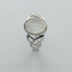 These is a beautiful pair of Sterling Silver Ring with a Rainbow Moonstone Gemstone. The ring are made out of solid 925 Silver and there is no nickel or other substances causing most allergies. This makes the ring hypo allergenic. Size of the Moonstone 1.2 x 0.8 cm or 0.47 x 0.31 inch You will receive the item in a gift box - perfect to surprise someone or yourself. Usually we ship on the same day we receive the payment for the order. We want you to be happy with your purchase. If you do not lik Oval Sterling Silver Opal Ring With Stone Setting, Sterling Silver Moonstone Ring With Polished Finish For Promise, Sterling Silver Opal Ring With Oval Cabochon For Anniversary, Formal Sterling Silver Moonstone Birthstone Ring, Adjustable White Gold Moonstone Ring, Sterling Silver White Gold Moonstone Ring, Silver Polished Moonstone Promise Ring, Sterling Silver Cabochon Moonstone Ring For Wedding, Sterling Silver Cabochon Crystal Anniversary Ring