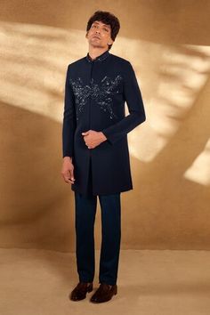 Blue sherwani with sequin, bead and threadwork embellished floral swirl motif on bodice. Comes with pant. - Aza Fashions Fitted Sequin Kurta With Traditional Drape, Designer Embellished Sherwani For Diwali, Embellished Bandhgala For Eid, Embellished Fitted Bandhgala For Eid, Designer Embellished Sherwani With Traditional Drape, Designer Wedding Kurta With Sequins, Designer Sequined Kurta For Wedding, Embellished Sherwani For Diwali, Elegant Sherwani With Sequins In Traditional Drape