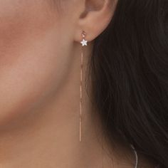 Earring Threader with Cubic Zirconia Star in Rose Gold Vermeil by Jungle Via Threader can be worn snug up to the Earlobe or pulled halfway dangling DETAILS Star 5mm x 8mm 3 1/2 inches long Long Earing Designs Gold, Rose Gold Star-shaped Pierced Jewelry, Rose Gold Star Jewelry For Parties, Rose Gold Star-shaped Party Jewelry, Dainty Star-shaped Rose Gold Earrings, Rose Gold Star-shaped Dainty Earrings, Dainty Rose Gold Star Earrings, Gold Earing Designs Unique, Sui Dhaga Gold Earrings Design