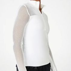 Made From Breathable Sculptknit Fabric, This Fitted Top Features Mesh On The Back, Sleeves, And Shoulders For Max Ventilation While Still Keeping You Covered. Features Breathable Moisture-Wicking Winter Sporty Fitted Tops, Functional Stretch Top For Winter, Spring Sports Half-zip Top, Spring Half-zip Sports Top, Spring Stretch Half-zip Activewear, Stretch Half-zip Spring Activewear, Stretch Half-zip Activewear For Spring, Fitted Sportswear Tops For Winter, Spring Half-zip Stretch Activewear