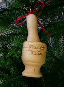 a wine bottle ornament hanging from a christmas tree with a red ribbon on it