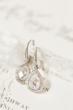 "Crystal earrings Wedding earrings chandelier Bridal earrings Silver Wedding earrings Silver Bridal Jewelry Glamorous Bridal Crystal Drop Earrings will add sweet sparkle to your wedding day. Marquise zircon crystals in a leafy design are completed with a Swarovski crystal teardrop. Comfortable, light, and very tender - they are a beautiful mid length earring. Nickel free & allergy free posts. Cz crystals set in rhodium. They are a perfect match to same bracelet. Description: -- Width earring Teardrop Chandelier Earrings With Sparkling Stones For Gift, Exquisite Teardrop Bridal Earrings Gift, Diamond White Teardrop Chandelier Earrings For Anniversary, Dainty Diamond-accented Earrings For Wedding, Dainty Diamond Accented Earrings For Wedding, Dainty Wedding Earrings With Diamond Accents, Dazzling Crystal Teardrop Bridal Earrings, White Teardrop Wedding Earrings With Diamond Accents, Exquisite Teardrop Chandelier Earrings With Diamond Accents